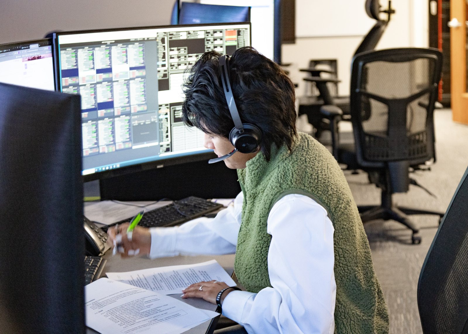 Control center operator at a monitoring station